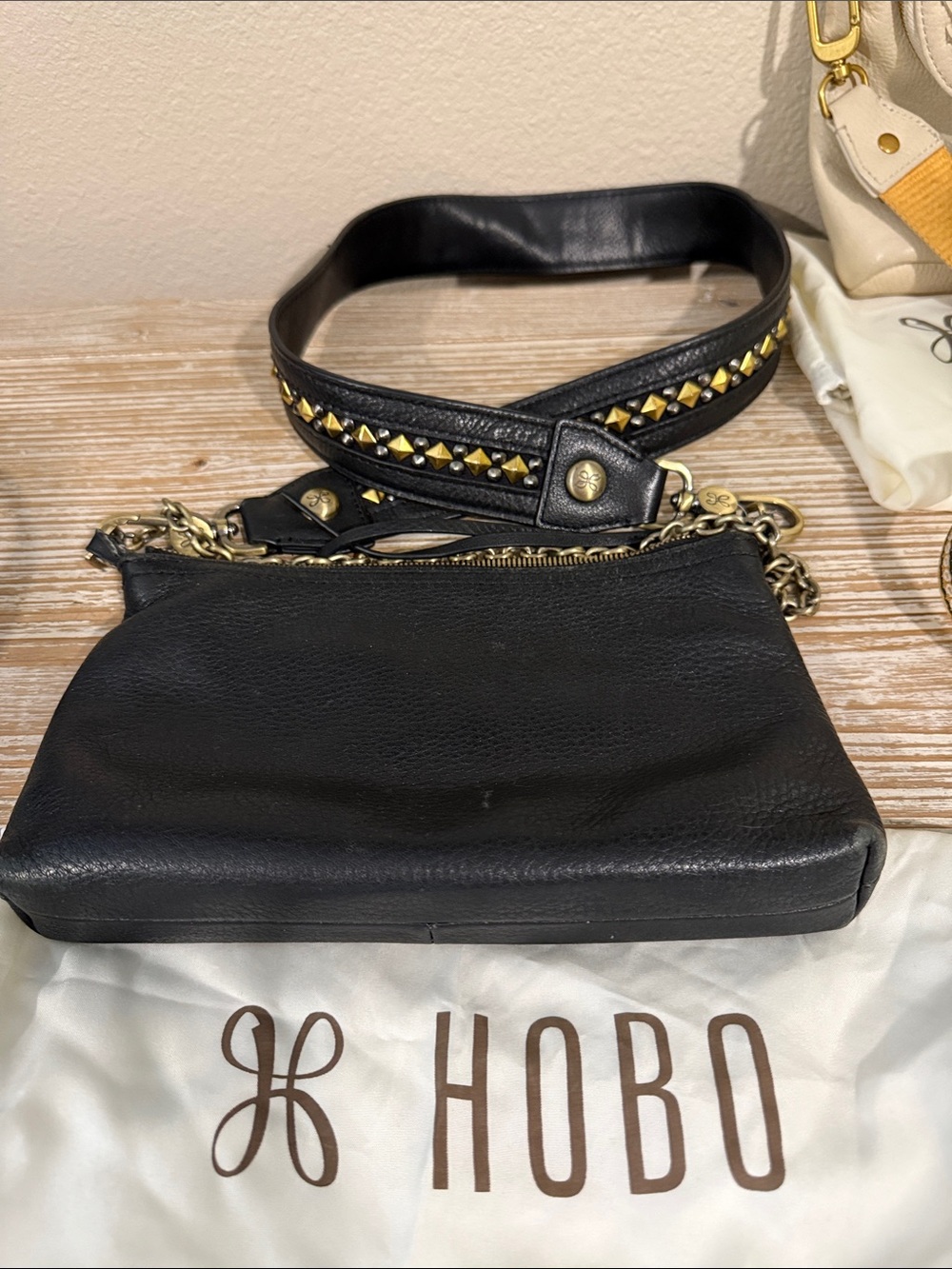 HOBO Black Leather Wristlet with Studded Strap and Gold Hardware